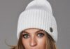 Почему нужно купить вязаные шапки оптом?