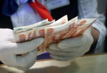 Тучи сгущаются: что будет с долларовыми вкладами в связи с санкциями