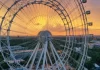 Верхняя точка колеса обозрения Солнце Москвы